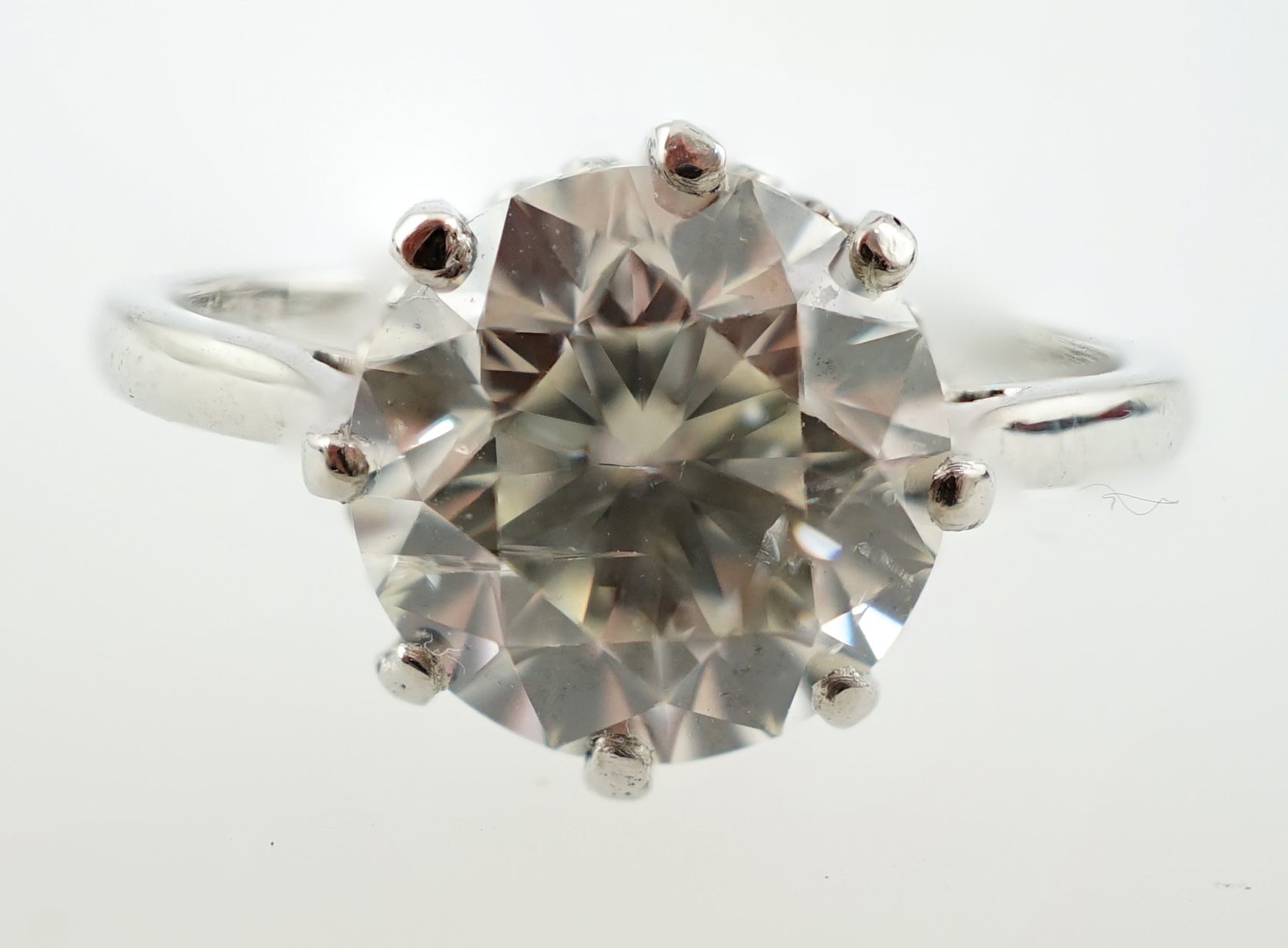 A platinum and solitaire diamond set ring